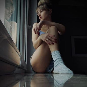 Flirty couple communicating comfortably while discussing sexy questions with trust and playful energy