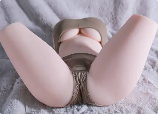 Evolova AI sex doll in golden lingerie lying on a bed, featuring intelligent features, realistic body design, and premium lifelike details.